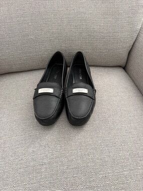 Coach Black Pebbled Leather Slip-On Loafers with Silver Plaque